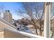 View from balcony overlooking a winter landscape and community at 13633 E Yale Ave # B, Aurora, CO 80015