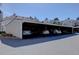 Carport parking offering covered spaces for residents and visitors, with multiple cars parked at 13633 E Yale Ave # B, Aurora, CO 80015