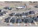 Aerial view of a Primary-planned community featuring a pool, tennis courts, and well-manicured landscaping at 12628 Bayshore St, Firestone, CO 80504