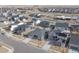 An aerial view captures the neighborhood homes with well-maintained lawns and landscaping, showcasing the community's layout and design at 12628 Bayshore St, Firestone, CO 80504