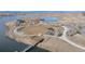 Stunning aerial view showcasing the community's scenic lake, walking trails, and playground areas at 12628 Bayshore St, Firestone, CO 80504