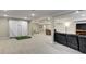 Large finished basement featuring a recreation area, living area, and a dining area at 12628 Bayshore St, Firestone, CO 80504