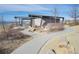 A lovely path through the community space near the lake is an ideal area for relaxing and playing at 12628 Bayshore St, Firestone, CO 80504