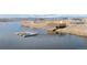 Lakeside dock and swim platform on a clear day, providing access to water activities at 12628 Bayshore St, Firestone, CO 80504