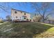Spacious backyard with a deck, perfect for outdoor entertaining, and a lush lawn at 6184 Clayton St, Frederick, CO 80530