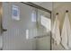 Bright, clean shower with white subway tile and glass doors with natural light from the shower windows at 1200 Sugarloaf Ln, Erie, CO 80516