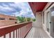 Outdoor balcony featuring wood flooring and neighborhood views at 980 S Locust St # D, Denver, CO 80224