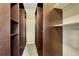 Walk-in closet with built-in shelving offering storage and organization at 980 S Locust St # D, Denver, CO 80224