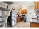 This is a lovely kitchen with tile floor and stainless steel appliances at 1365 Clayton St, Denver, CO 80206