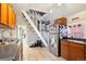 This is a lovely kitchen with tile floor and stainless steel refrigerator at 1365 Clayton St, Denver, CO 80206