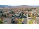 Charming neighborhood featuring lush landscapes and mountain views on a clear day at 2829 S Fig St, Lakewood, CO 80228