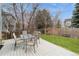 Backyard deck featuring outside seating, and landscaping at 2829 S Fig St, Lakewood, CO 80228