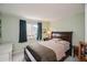 Cozy bedroom with plush carpet, window, and ample natural light at 2829 S Fig St, Lakewood, CO 80228