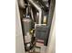 Utility closet containing a Rheem water heater and a Goodman HVAC system at 1265 S Biscay St, Aurora, CO 80017