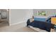 Bright bedroom featuring a window and stylish decor, creating a cozy and inviting space at 943 S Zeno Way # 102, Aurora, CO 80017