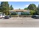 Attractive clubhouse featuring stone accents, well-maintained landscaping, and convenient parking at 943 S Zeno Way # 102, Aurora, CO 80017