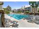 Beautiful pool surrounded by condos, and plenty of poolside seating creating a relaxing retreat at 943 S Zeno Way # 102, Aurora, CO 80017