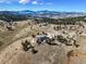 View of the home with beautiful mountain views in the background at 156 S Lookout Mountain Rd, Golden, CO 80401