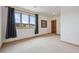Bedroom featuring a scenic window view and carpeted floor at 156 S Lookout Mountain Rd, Golden, CO 80401