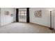 Spacious bedroom with natural light and carpet flooring at 156 S Lookout Mountain Rd, Golden, CO 80401