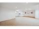 A bright, open bonus room with carpeted floors and natural light, perfect for a playroom or home office at 156 S Lookout Mountain Rd, Golden, CO 80401