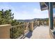 Expansive deck offers stunning views of the surrounding landscape, providing a serene outdoor living space for relaxation and enjoyment at 156 S Lookout Mountain Rd, Golden, CO 80401