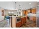 A spacious kitchen featuring custom wood cabinetry, granite countertops, and stainless steel appliances at 156 S Lookout Mountain Rd, Golden, CO 80401