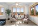 Relaxing sitting room with mountain views, comfortable chairs, and abundant natural light at 156 S Lookout Mountain Rd, Golden, CO 80401