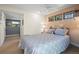 Bright bedroom featuring multiple windows with views of the surrounding landscape and comfortable decor at 1560 Findlay Way, Boulder, CO 80305