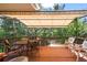 Spacious outdoor deck with shade covering, perfect for al fresco dining and entertaining guests in style at 1560 Findlay Way, Boulder, CO 80305