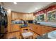 Updated kitchen with ample cabinet space, stone countertops, and modern appliances at 1560 Findlay Way, Boulder, CO 80305