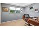 Functional office space with natural light, built in desk and carpet floors at 1560 Findlay Way, Boulder, CO 80305