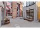 Exterior view of courtyard featuring outdoor seating areas and well-kept landscaping at 3225 Blake St # 8, Denver, CO 80205