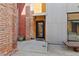 Exterior view of courtyard highlighting building architecture and outdoor access at 3225 Blake St # 8, Denver, CO 80205