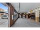 Covered parking area with brick accents at 3225 Blake St # 8, Denver, CO 80205