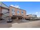 Exterior view of the building with covered parking at 3225 Blake St # 8, Denver, CO 80205