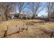 Large backyard with mature trees and a storage shed at 4631 Ashfield Dr, Boulder, CO 80301