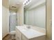 Bathroom featuring a large mirror, white vanity, and a glass shower at 4631 Ashfield Dr, Boulder, CO 80301