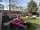 Landscaped backyard featuring a hammock, seating area, and ample space for outdoor enjoyment at 57 N 45Th Ave, Brighton, CO 80601