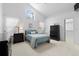 Vaulted ceiling primary bedroom filled with natural light, complete with a walk-in closet at 3695 Quail St, Wheat Ridge, CO 80033