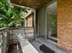 Cozy brick balcony offering a private outdoor space at 2500 S York St # 204, Denver, CO 80210