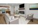 Bright living room with modern fireplace, mounted TV, and open floor plan at 2500 S York St # 204, Denver, CO 80210