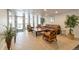 Spacious lobby with comfortable seating, tiled floors, recessed lighting, and decorative plants at 2500 S York St # 204, Denver, CO 80210
