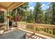 Comfortable deck offering ample seating, a grill, and tranquil views of the surrounding trees at 19165 Golden Arrow Cir, Monument, CO 80132