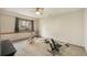 Spacious basement area with carpet flooring and natural light, perfect for a home gym at 19165 Golden Arrow Cir, Monument, CO 80132