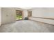 Large basement area with carpet flooring, storage cabinets, and natural light at 19165 Golden Arrow Cir, Monument, CO 80132