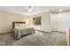 Bedroom featuring carpet, a ceiling fan and a window at 19165 Golden Arrow Cir, Monument, CO 80132