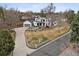 Aerial view showcasing the property's curb appeal and manicured landscaping at 815 E Westglow Ln, Greenwood Village, CO 80121