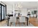 Open dining area connects to the chef's kitchen and living area, creating a perfect space for gatherings at 815 E Westglow Ln, Greenwood Village, CO 80121