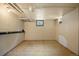 Unfinished basement with concrete floors and exposed pipes at 346 N Corona St, Denver, CO 80218